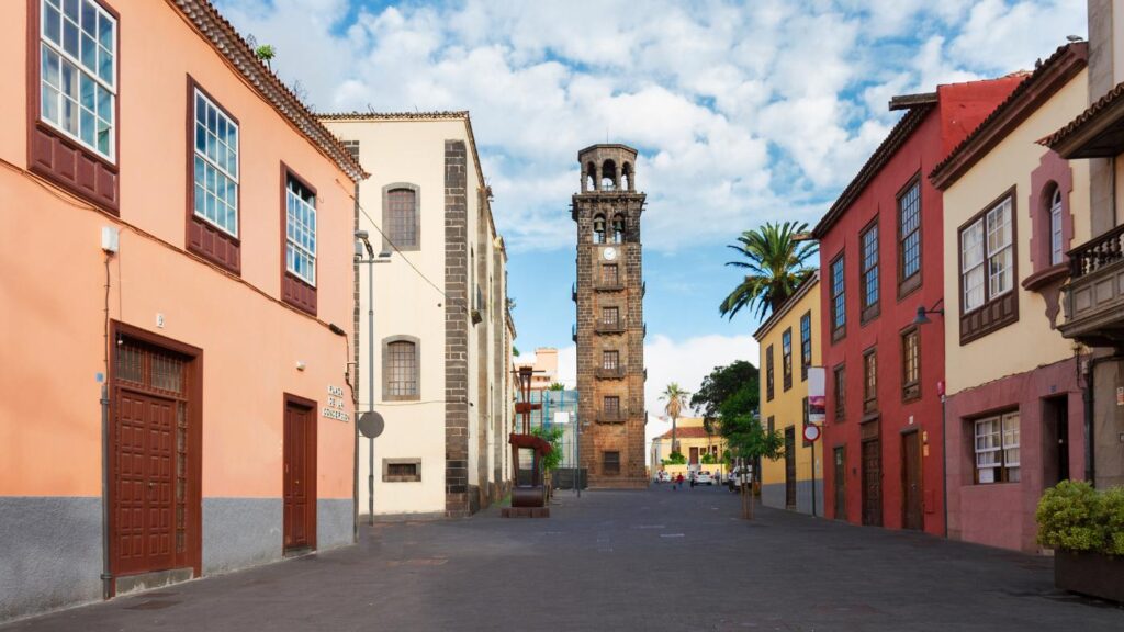 San Cristobal de la Laguna Old town with tower clock at the end of the street.